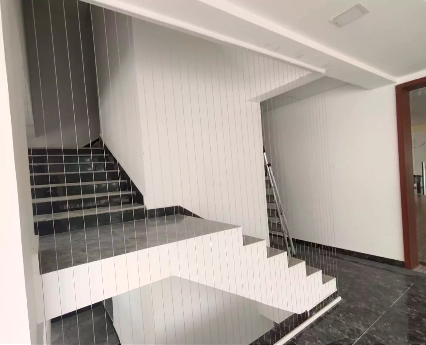 Open staircase invisible grills – invisible grill installation by HomeNest Invisible Grills